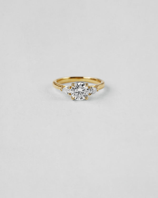 Pear Cut Three Stone Engagement Ring