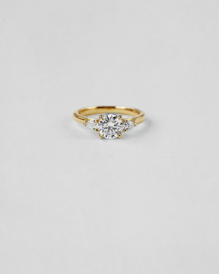 Pear Cut Three Stone Engagement Ring
