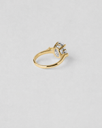 Oval and Baguette Three Stone Engagement Ring — Yellow gold