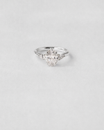 Oval Cut Three Stone Engagement Ring — White gold