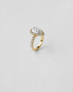Pear Cut Halo Engagement Ring — Yellow gold