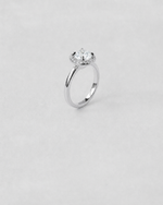 Round Cut Halo Engagement Ring — White gold