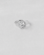 Round Cut Halo Engagement Ring — White gold