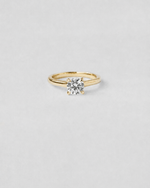 Cross Over Solitaire Engagement Ring — Yellow gold