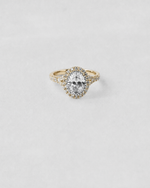 Split Shank Oval Halo Engagement Ring — Yellow gold