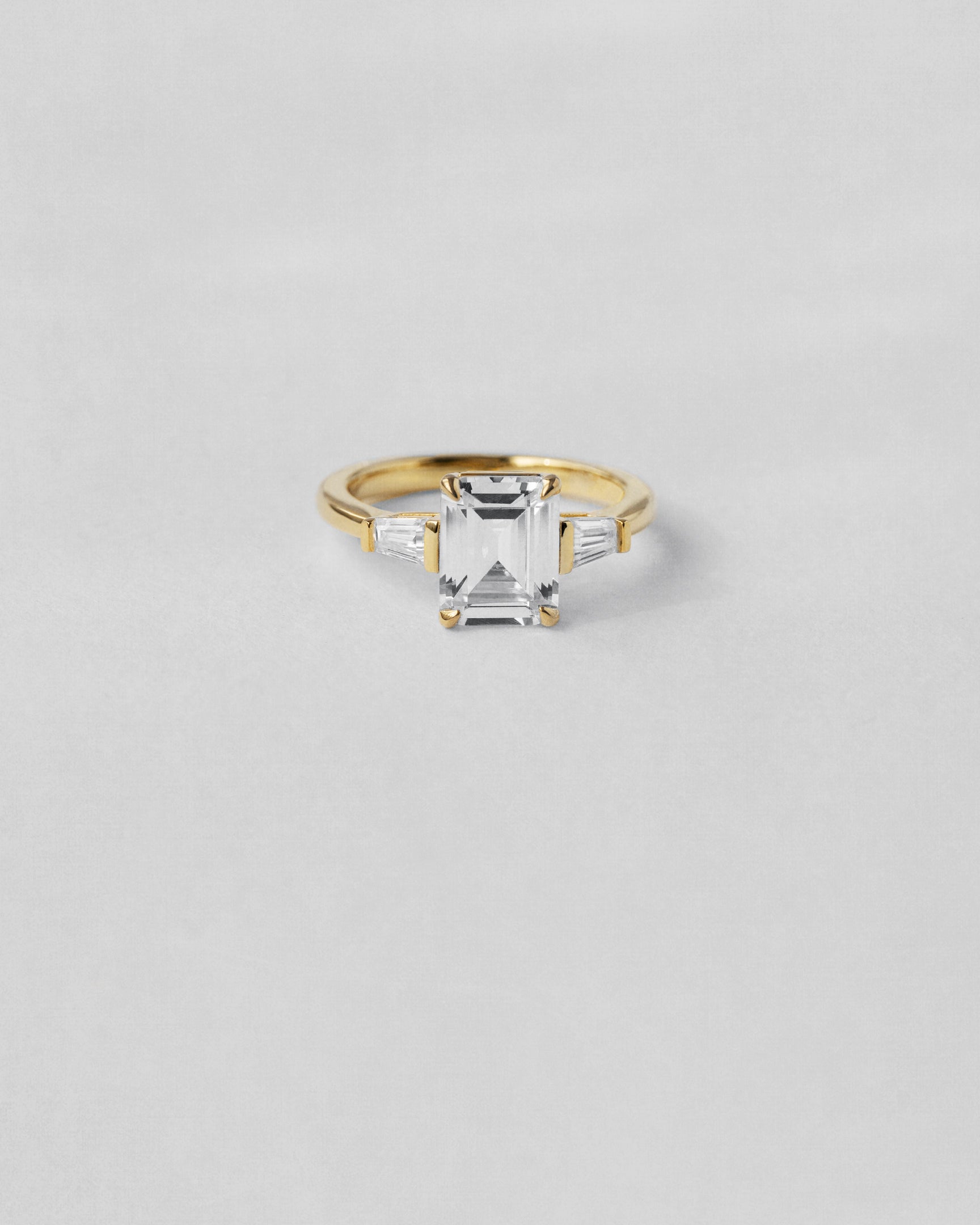 Emerald Cut Three Stone Engagement Ring