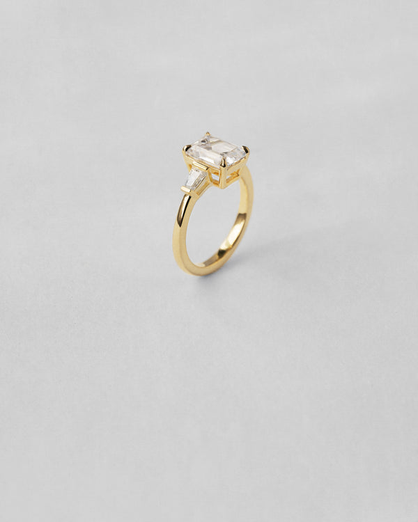 Emerald Cut Three Stone Engagement Ring