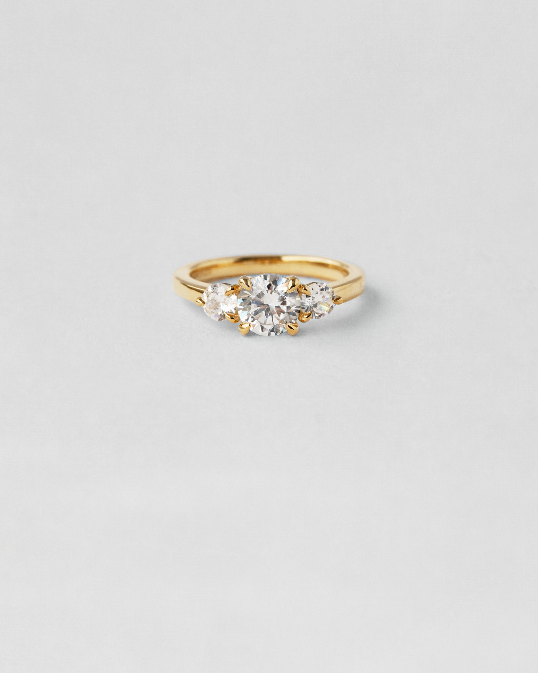 Round Cut Three Stone Engagement Ring