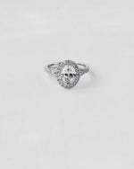 Split Shank Oval Halo Engagement Ring
