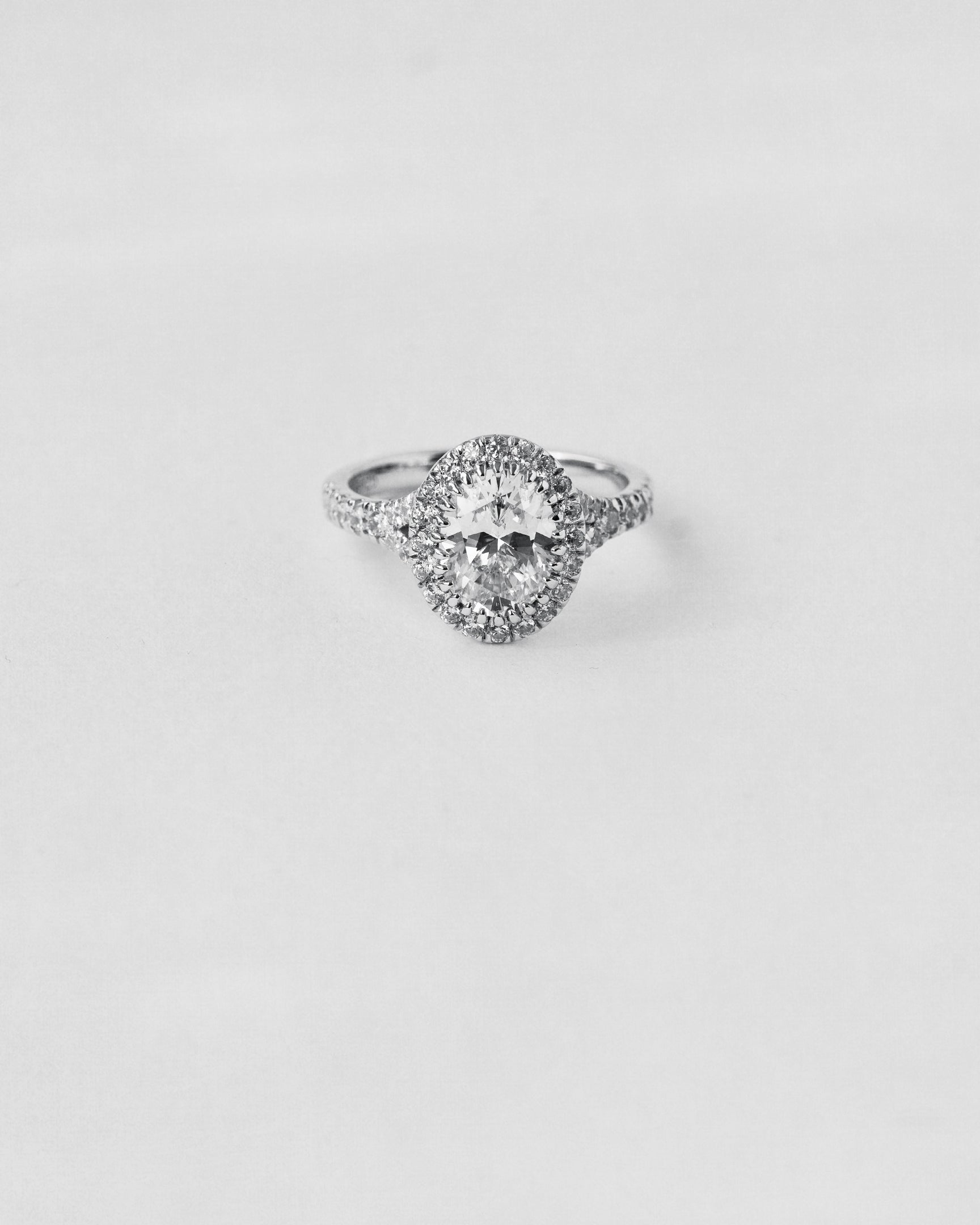Split Shank Oval Halo Engagement Ring