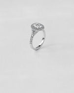 Split Shank Oval Halo Engagement Ring