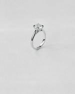 Brilliant Cut Tapered Engagement Ring