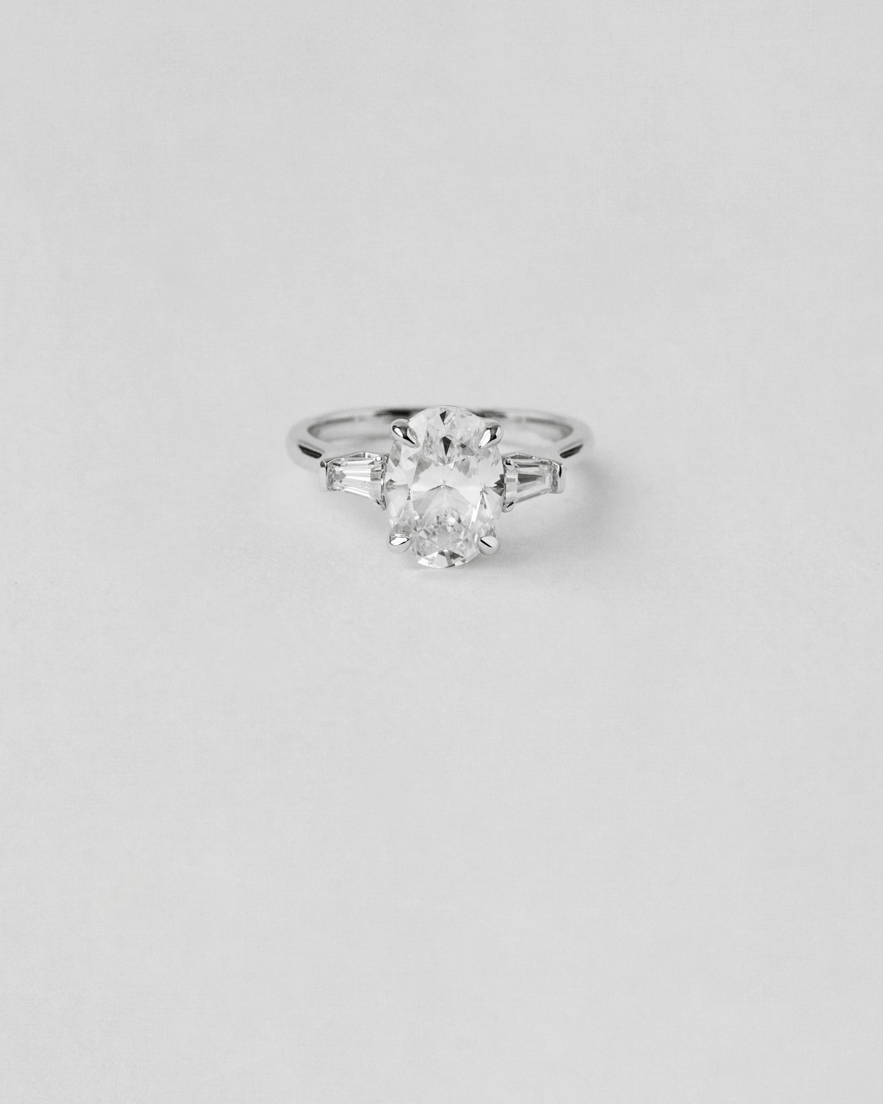Oval and Baguette Three Stone Engagement Ring
